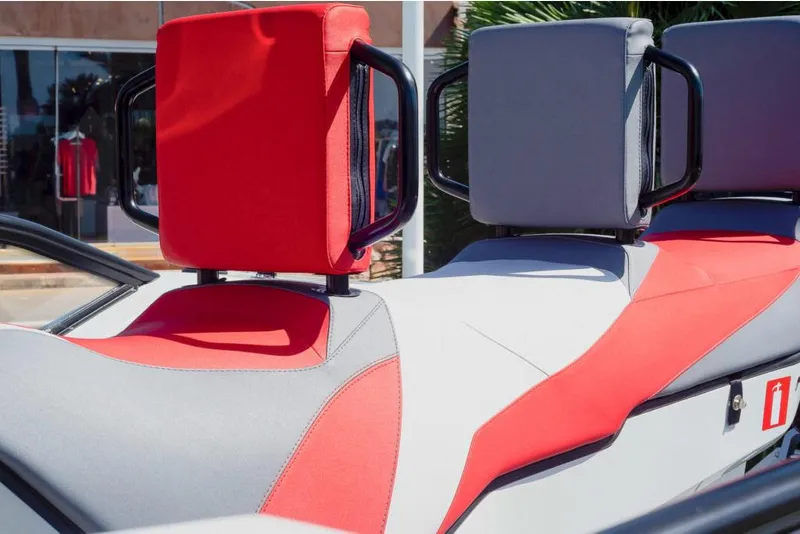 Slide: The Image of 2023 Saxdor 200 Pro Sport boat seats in red and gray upholstery. - 10