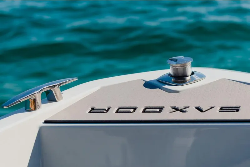 Slide: The Image of 2023 Saxdor 200 Pro Sport boat detail with ocean background. - 13