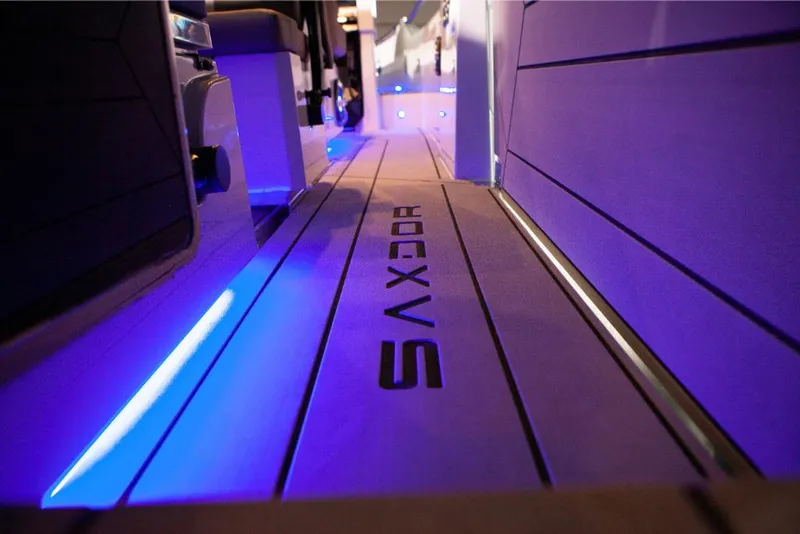 Slide: The Image of 2023 Saxdor 320 GTO boat interior with blue LED lighting. - 17