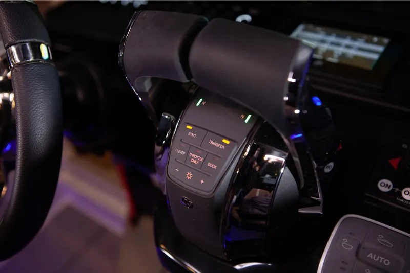 Slide: The Image of Throttle controls of the 2023 Saxdor 320 GTO boat. - 20