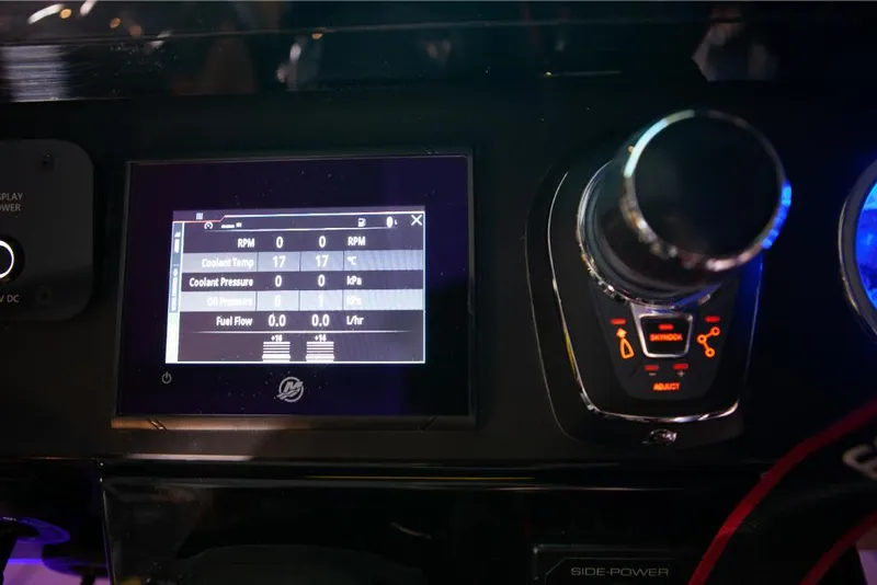 Slide: The Image of Dashboard of 2023 Saxdor 320 GTO showing engine metrics and control knob. - 28