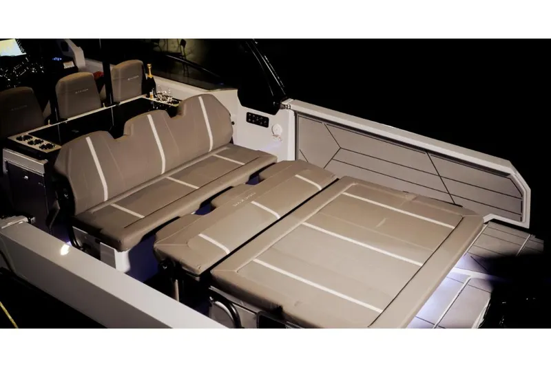 Slide: The Image of 2023 Saxdor 320 GTO interior seating area with beige cushions. - 30