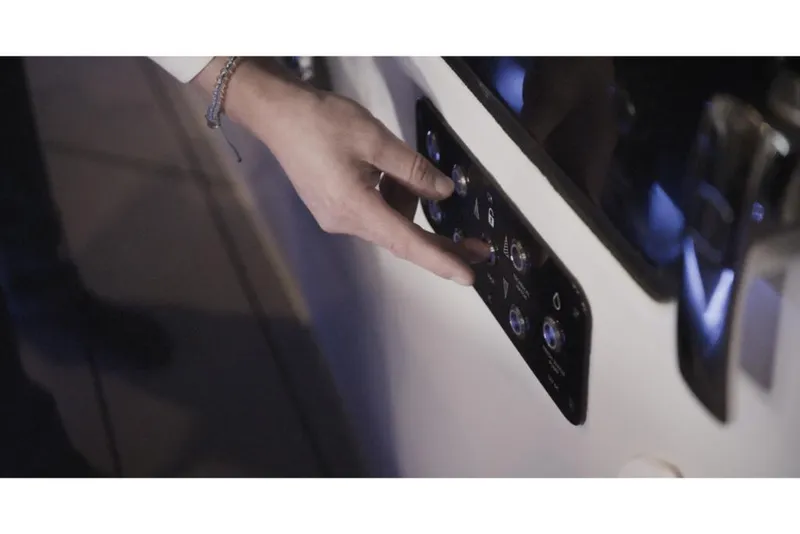 Slide: The Image of Hand operating control panel on 2023 Saxdor 320 GTO boat. - 31