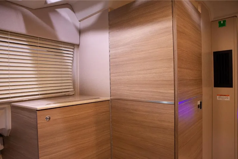 Slide: The Image of Interior of 2023 Saxdor 320 GTO with wooden cabinetry and window blinds. - 43