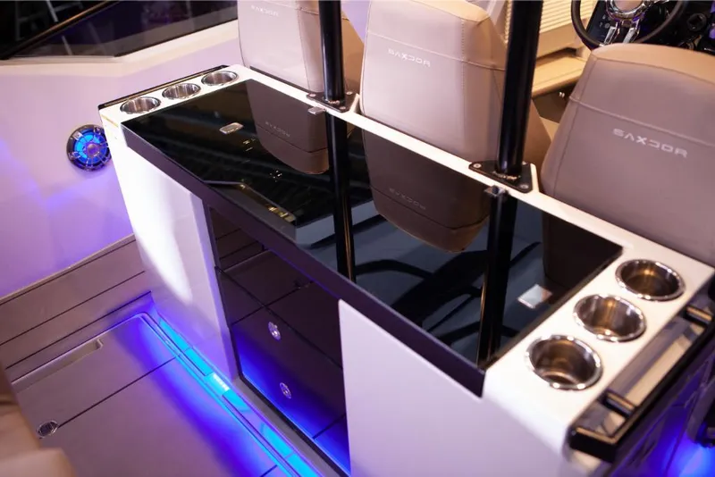 Slide: The Image of 2023 Saxdor 320 GTO interior with illuminated seating and sleek console. - 7