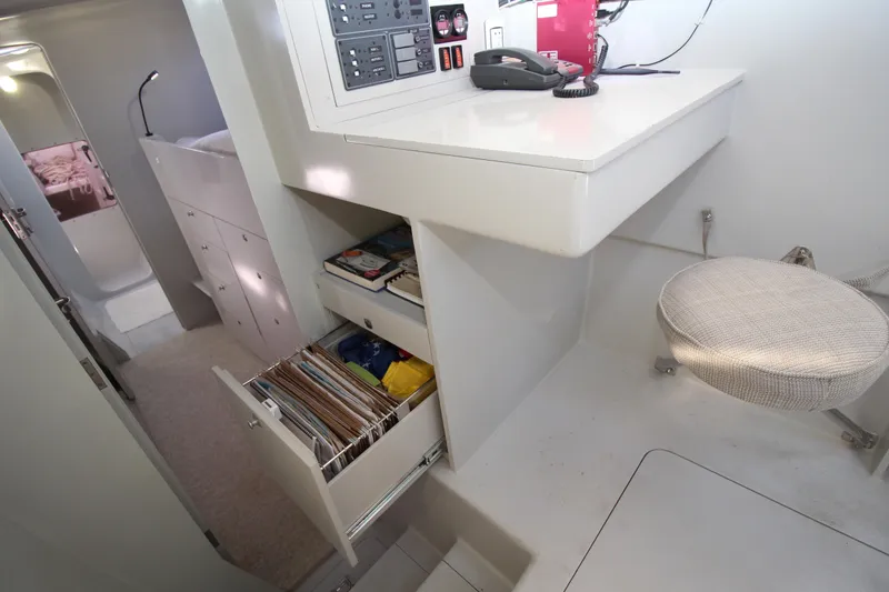 Slide: The Image of Interior of 2016 Chris White ATLANTIC 47 yacht with storage drawers and control panel. - 14