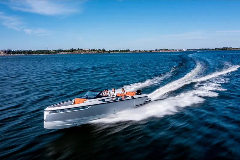 Slide: The Image of 2023 Saxdor 320 GTR speeding on open water, showcasing sleek design and performance. - 6