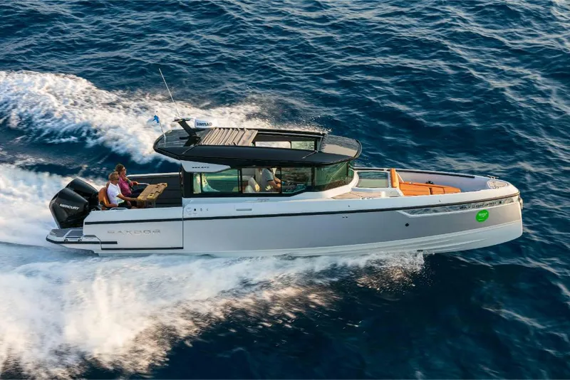 Slide: The Image of 2023 Saxdor 320 GTC cruising on open water. - 17