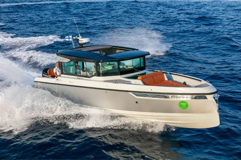 Slide: The Image of 2023 Saxdor 320 GTC cruising on open water. - 25