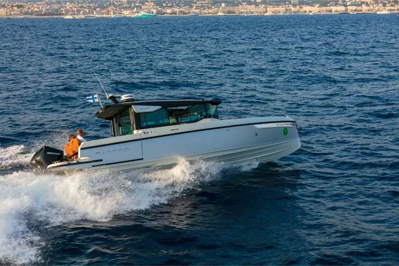 Slide: The Image of 2023 Saxdor 320 GTC motorboat cruising on the ocean near the coastline. - 49