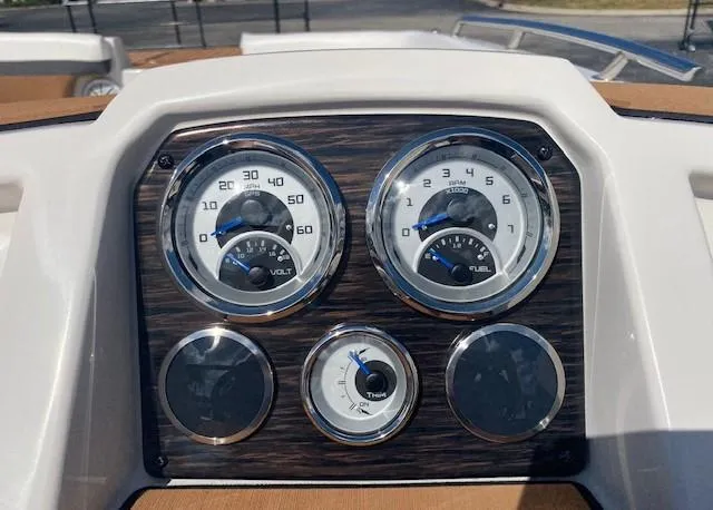 Slide: The Image of Dashboard of 2022 Starcraft SVX 191 OB boat with gauges for voltage, fuel, and trim. - 21