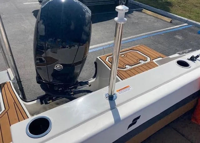Slide: The Image of 2022 Starcraft SVX 191 OB boat stern with outboard motor and deck. - 28