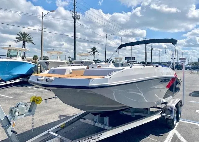 Slide: The Image of 2022 Starcraft SVX 191 OB boat on a trailer in a parking lot. - 5