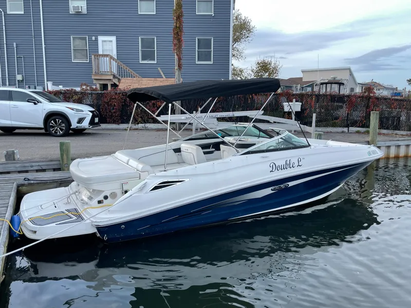 The Image of 2015 Sea Ray 240 Sundeck boat docked at marina. - 0