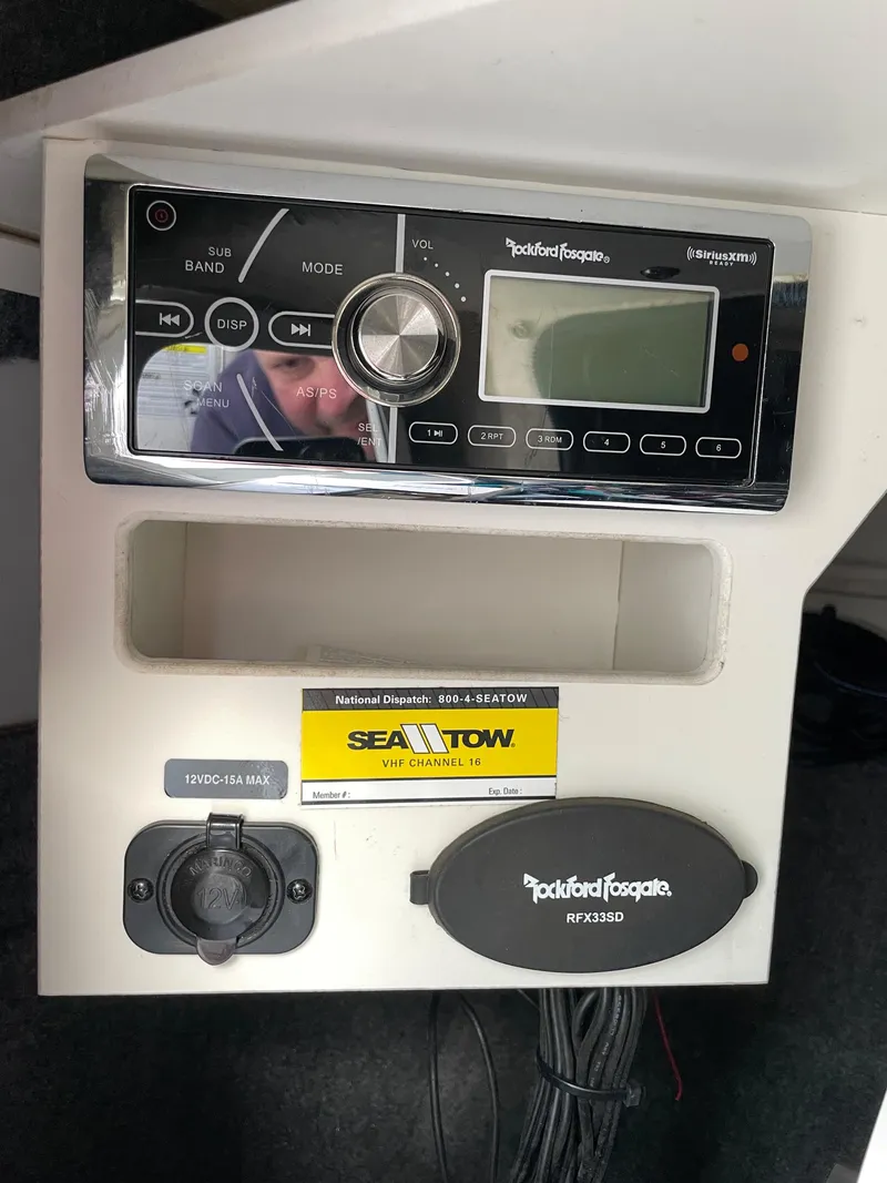 Slide: The Image of Rockford Fosgate stereo system on a 2015 Sea Ray 240 Sundeck boat. - 11