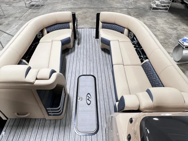 Slide: The Image of 2024 Harris 250 Grand Mariner V10 400 pontoon boat interior with luxurious seating. - 20