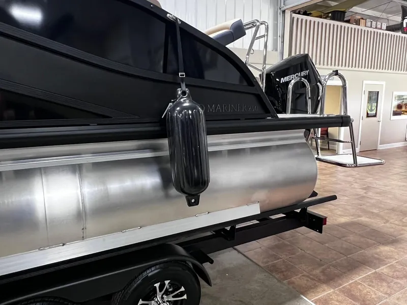 Slide: The Image of 2024 Harris FloteBote 250 Grand Mariner V10 400 pontoon boat in showroom. - 5