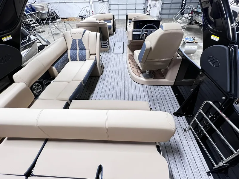 Slide: The Image of 2024 Harris 250 Grand Mariner V10 400 interior with beige seating and modern design. - 14