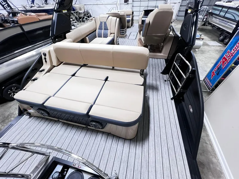 Slide: The Image of 2024 Harris 250 Grand Mariner V10 400 interior with beige seating and modern design. - 15