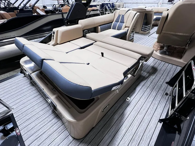Slide: The Image of 2024 Harris 250 Grand Mariner V10 400 boat interior with luxurious seating and modern design. - 18