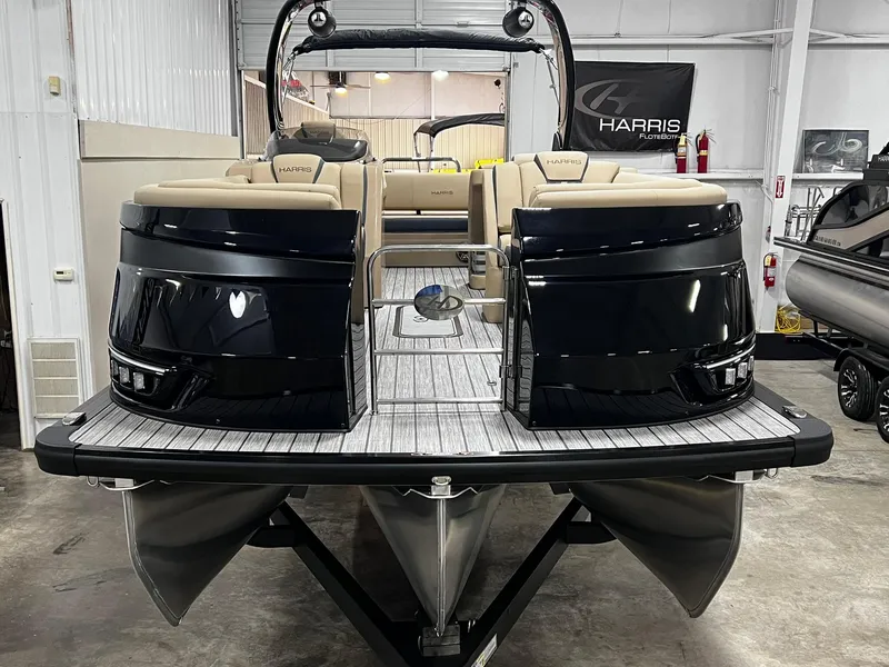 Slide: The Image of 2024 Harris 250 Grand Mariner V10 400 pontoon boat in showroom. - 21