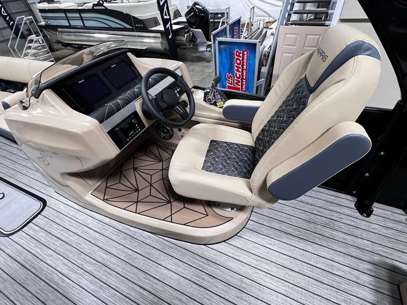 Slide: The Image of 2024 Harris 250 Grand Mariner V10 400 boat interior with modern helm and luxurious seating. - 8