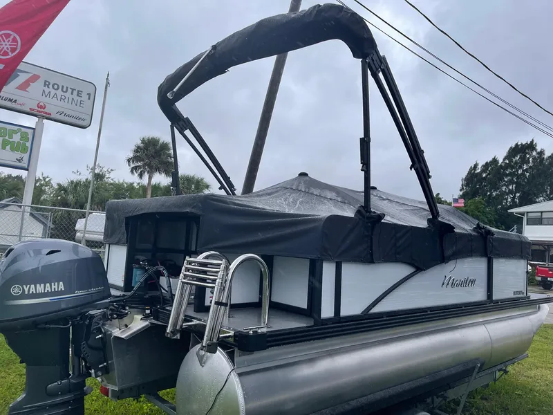 Slide: The Image of 2022 Manitou 18 Aurora pontoon boat with Yamaha motor at Route 7 Marine. - 11