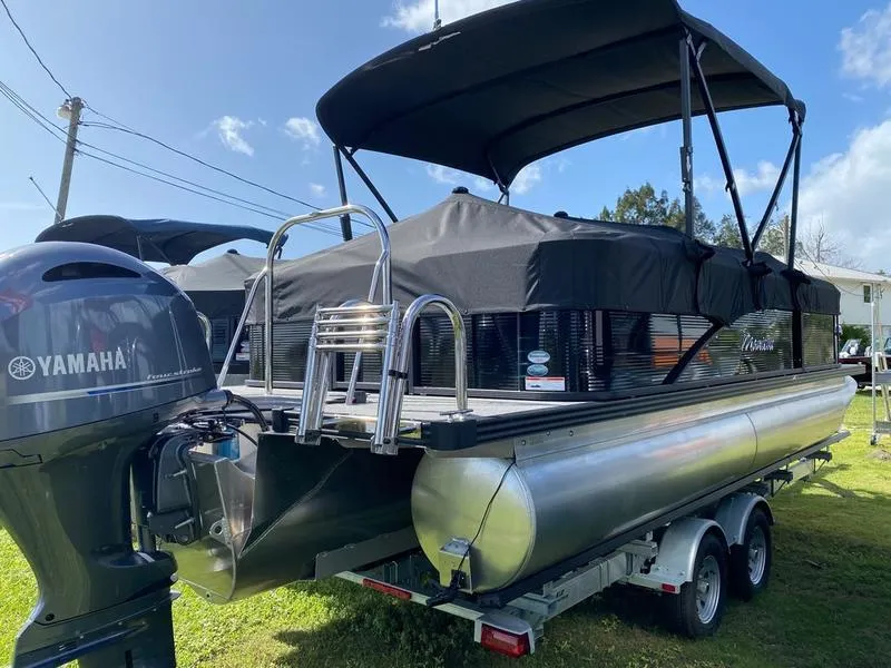 Slide: The Image of 2021 Manitou 21 AURORA LE RF VP pontoon boat with Yamaha outboard motor. - 11