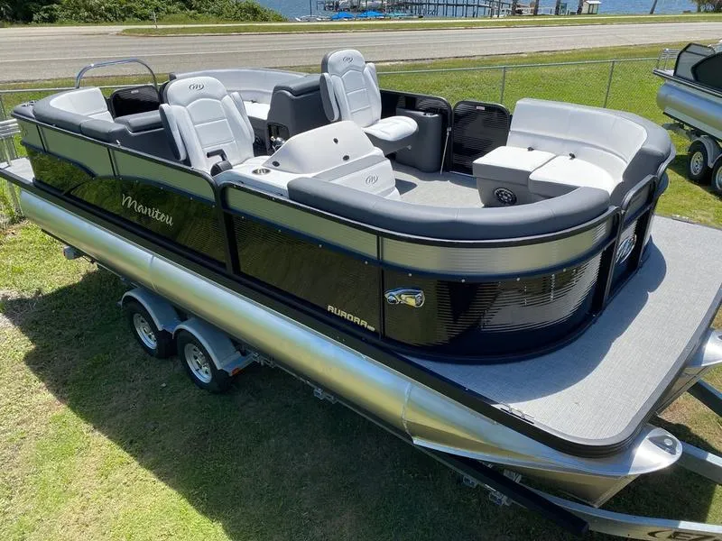 Slide: The Image of 2021 Manitou 21 AURORA LE RF VP pontoon boat on a trailer. - 9