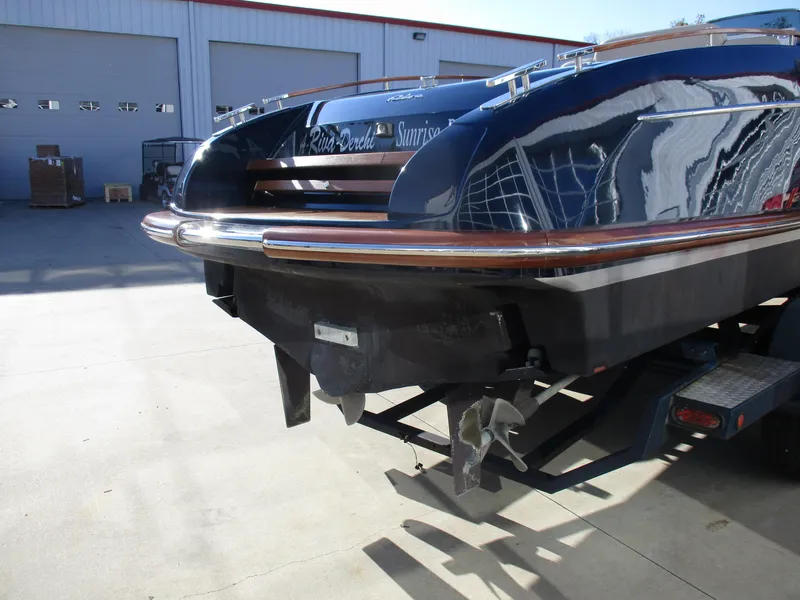 Slide: The Image of 2005 Riva 33 SUNRIVA boat rear view on trailer in a marina. - 9