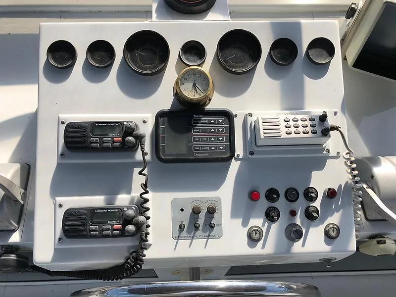 Slide: The Image of Control panel of a 1989 Pluckebaum 75 Coastal Cruiser boat. - 19