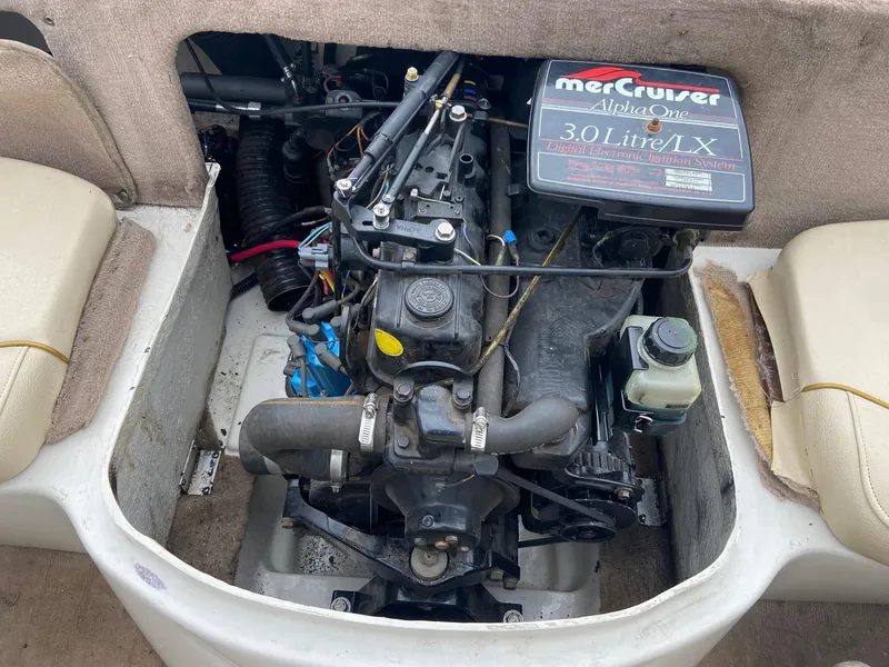 Slide: The Image of Sea Ray 180BR 2000 boat engine compartment with MerCruiser Alpha One 3.0L LX engine. - 13