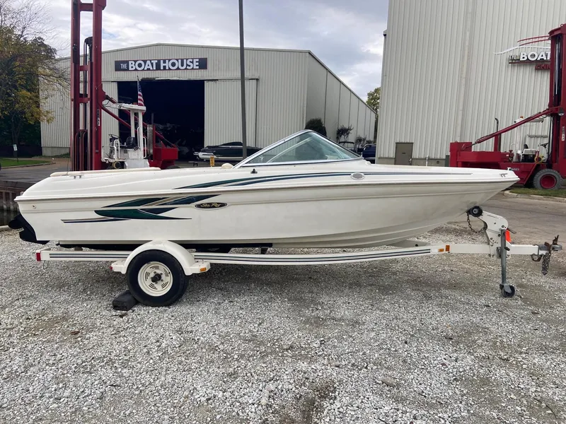 Slide: The Image of 2000 Sea Ray 180BR boat on trailer outside The Boat House. - 15