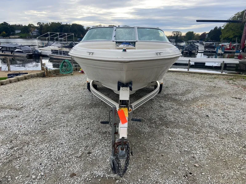 Slide: The Image of 2000 Sea Ray 180BR boat on trailer at marina. - 5