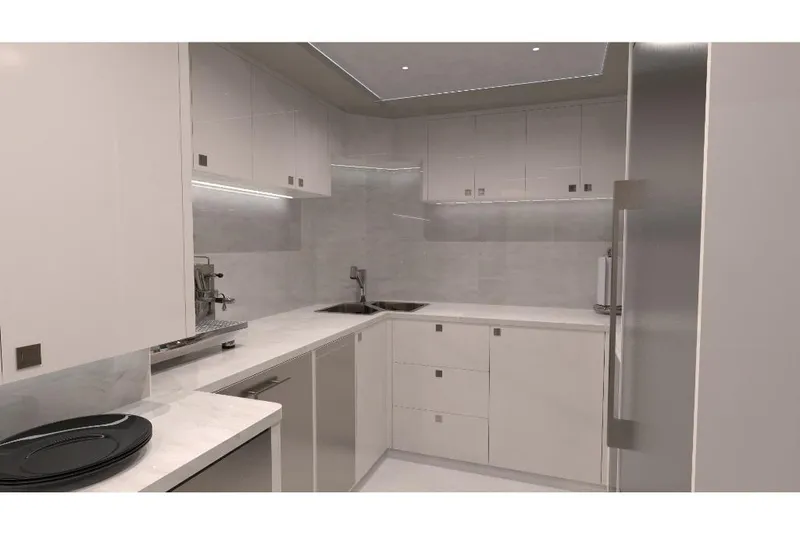 Slide: The Image of Modern kitchen in 2023 Ocean Alexander 27R yacht with sleek white cabinetry and stainless steel appliances. - 24