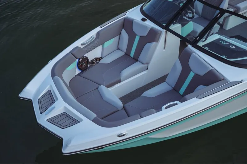 Slide: The Image of 2023 MasterCraft XT24 boat with spacious, modern seating and sleek design. - 35