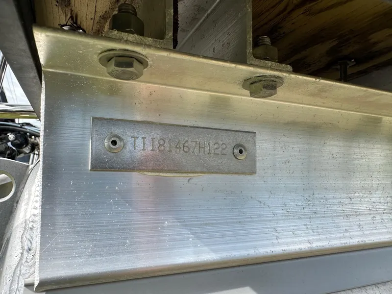 Slide: The Image of 2022 Manitou 20 Aurora Angler LE Standard boat hull identification number (HIN) plate. - 27