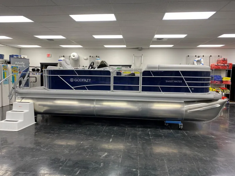 Slide: The Image of 2022 Godfrey Sweetwater 2186 C4 pontoon boat in showroom. - 12