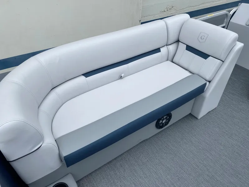 Slide: The Image of 2022 Godfrey Sweetwater 2186 C4 boat seating with white and blue upholstery. - 2