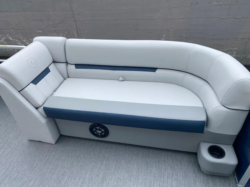 Slide: The Image of 2022 Godfrey Sweetwater 2186 C4 boat seating with cup holder and speaker. - 3