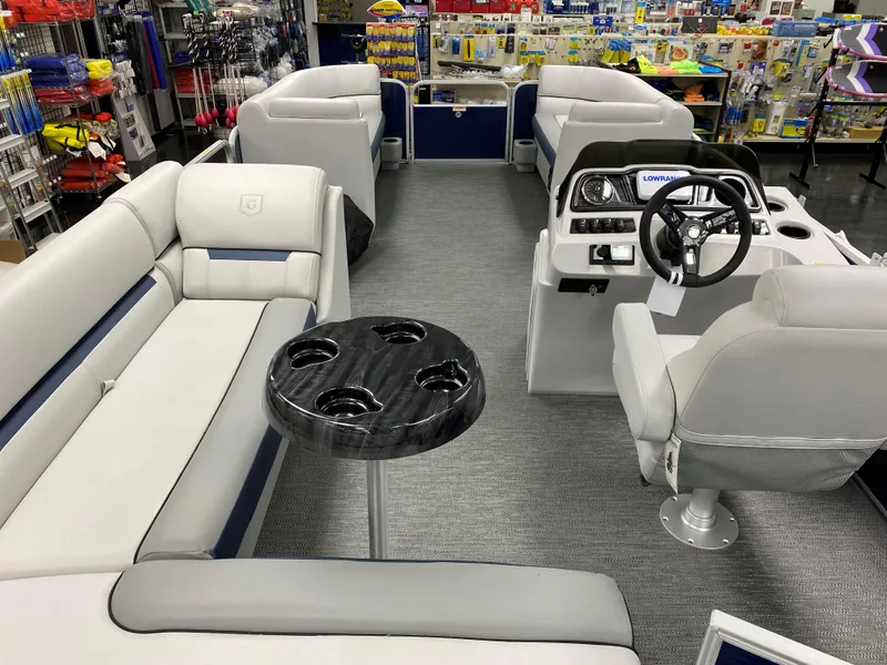 Slide: The Image of 2022 Godfrey Sweetwater 2186 C4 pontoon boat interior with seating and steering console. - 9