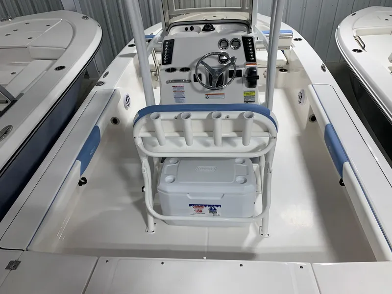 Slide: The Image of 2024 Robalo 226 Cayman boat interior with console and seating. - 3