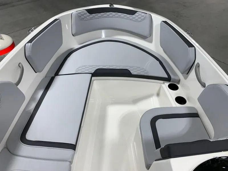 Slide: The Image of 2024 Bayliner Element M15 boat interior with gray and white seating. - 6