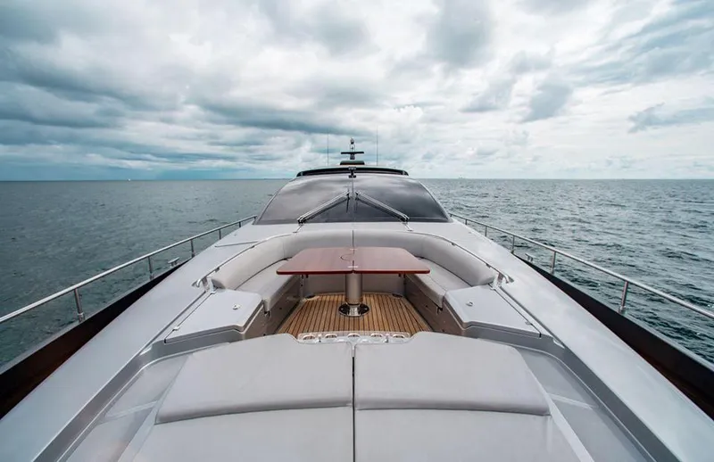 Slide: The Image of 2017 Riva 88 Domino Super yacht on open sea under cloudy sky. - 13