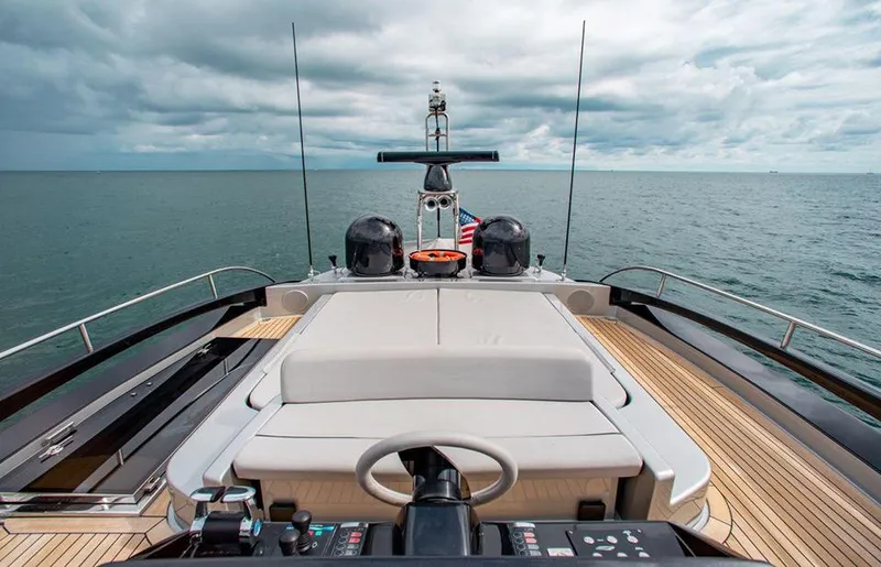 Slide: The Image of 2017 Riva 88 Domino Super yacht deck with ocean view and control panel. - 20