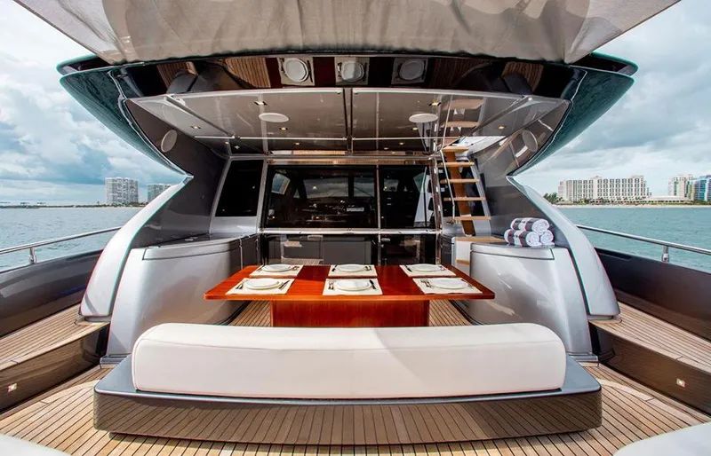 Slide: The Image of Luxury 2017 Riva 88 Domino Super yacht with elegant outdoor dining area. - 25