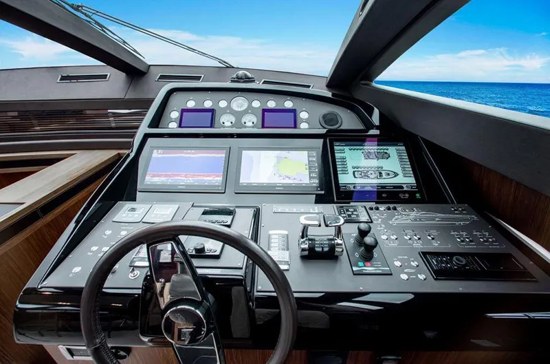 Slide: The Image of Helm station of 2017 Riva 88 Domino Super yacht with advanced navigation systems. - 32