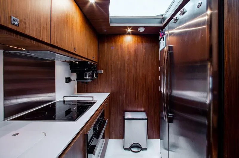 Slide: The Image of Modern kitchen interior of 2017 Riva 88 Domino Super yacht with stainless steel appliances. - 33