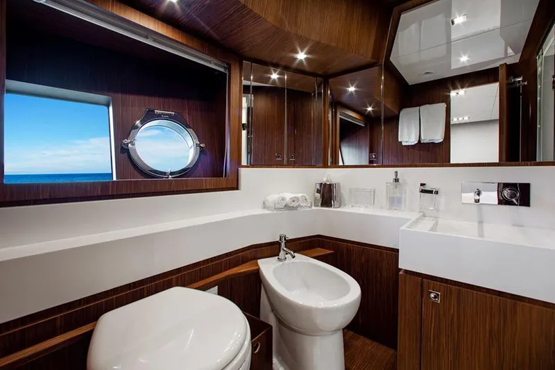 Slide: The Image of Luxurious bathroom on the 2017 Riva 88 Domino Super yacht with ocean view. - 42