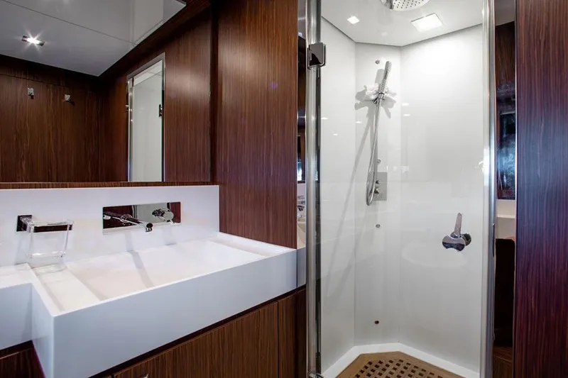 Slide: The Image of Modern bathroom on 2017 Riva 88 Domino Super yacht with sleek shower and sink. - 43